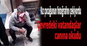 Kız çocuğunun fotoğrafını çekiyordu