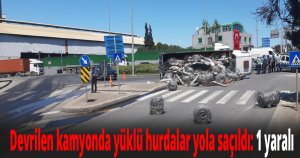 Devrilen kamyonda yüklü hurdalar yola saçıldı