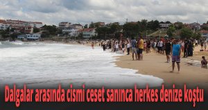 Dalgalar arasında cismi ceset sanınca herkes denize koştu