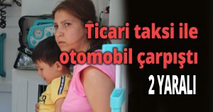 Ticari taksi ile otomobil çarpıştı