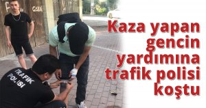 Kaza yapan gencin yardımına trafik polisi koştu