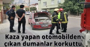  Kaza yapan otomobilden çıkan dumanlar korkuttu