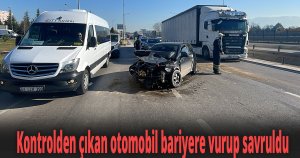 Kontrolden çıkan otomobil bariyere vurup savruldu