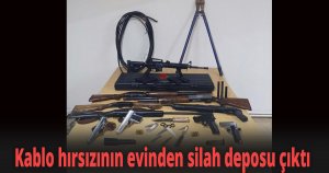 Kablo hırsızının evinden silah deposu çıktı