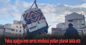 Yokuş aşağıya inen servis minibüsü yoldan çıkarak takla attı