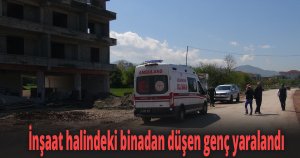 İnşaat halindeki binadan düşen genç yaralandı