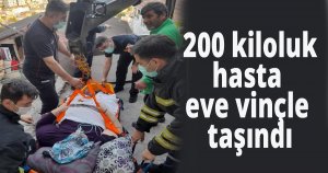  200 kiloluk hasta eve vinçle taşındı