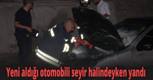 Yeni aldığı otomobili seyir halindeyken yandı