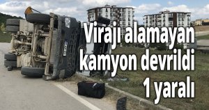 Virajı alamayan kamyon devrildi