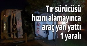 Tır sürücüsü hızını alamayınca araç yan yattı