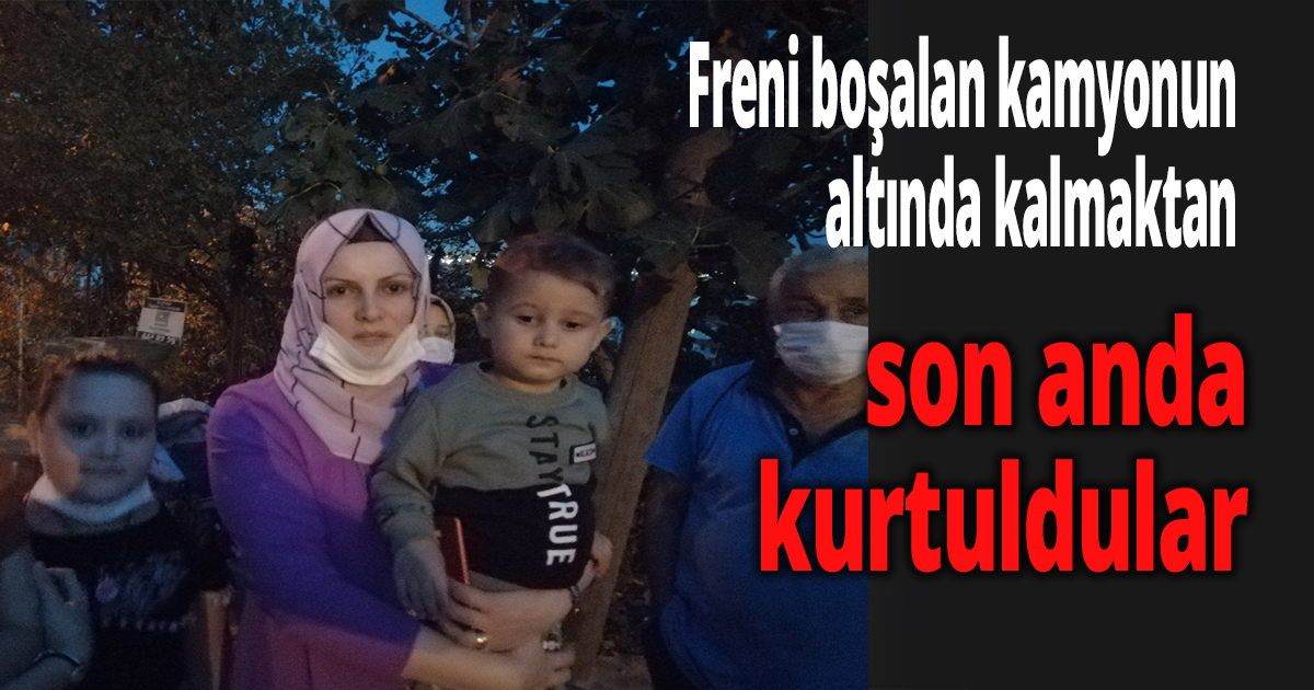 Freni boşalan kamyonun altında kalmaktan son anda kurtuldular
