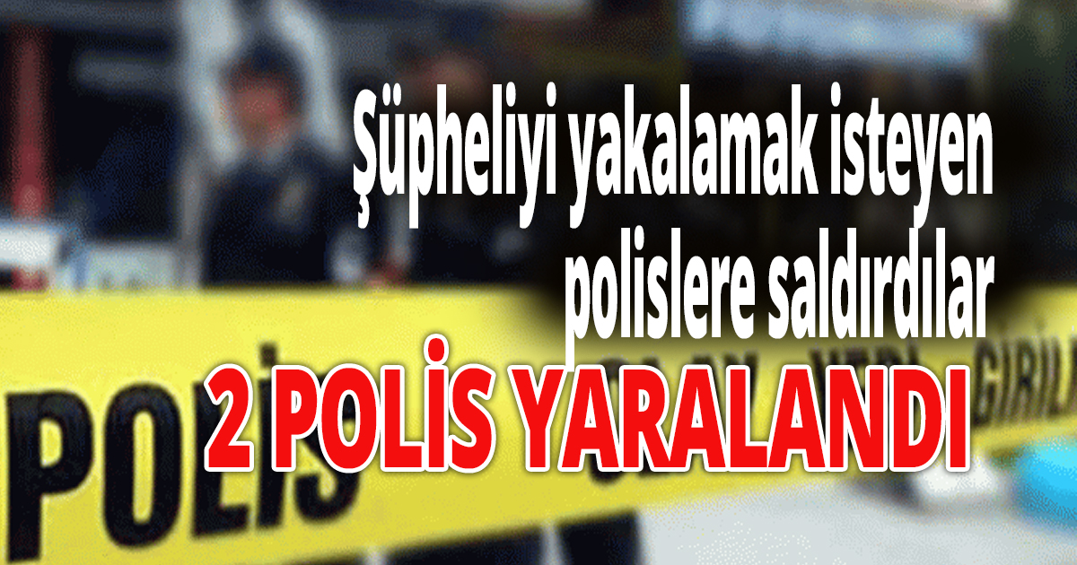 Şüpheliyi yakalamak isteyen polislere saldırdılar