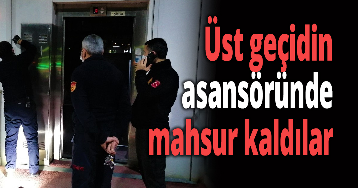 Üst geçidin asansöründe mahsur kaldılar