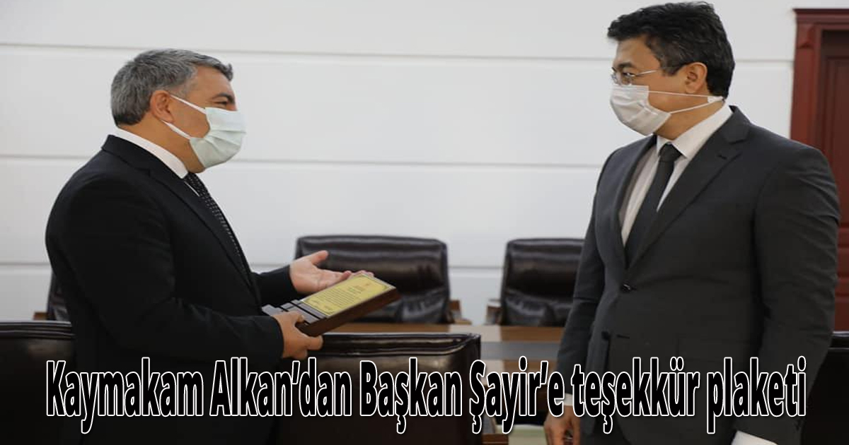 Kaymakam Alkan’dan Başkan Şayir’e teşekkür plaketi 