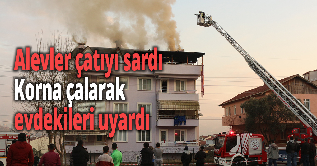 Alevlerin çatısını sardığı binada yaşayanları korna çalarak uyardı