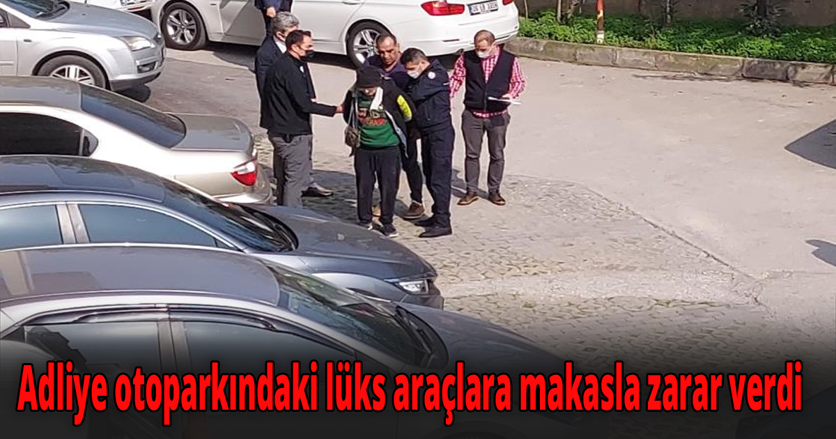 Adliye otoparkındaki lüks araçlara makasla zarar verdi