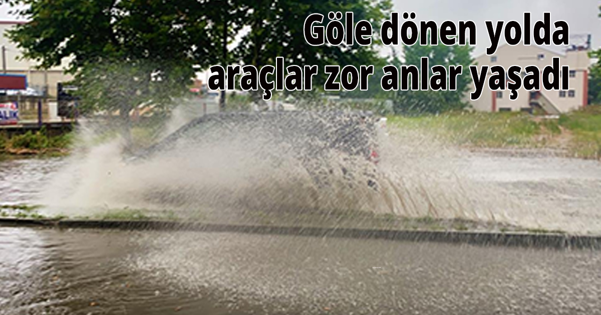 Göle dönen yolda araçlar zor anlar yaşadı