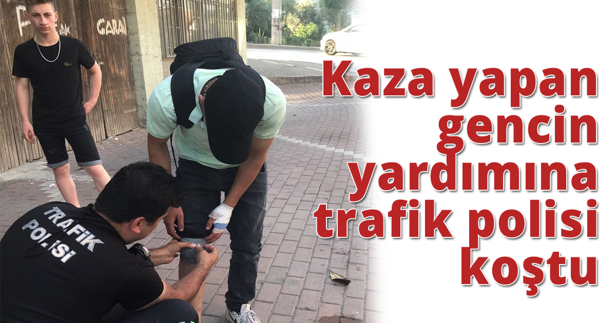 Kaza yapan gencin yardımına trafik polisi koştu
