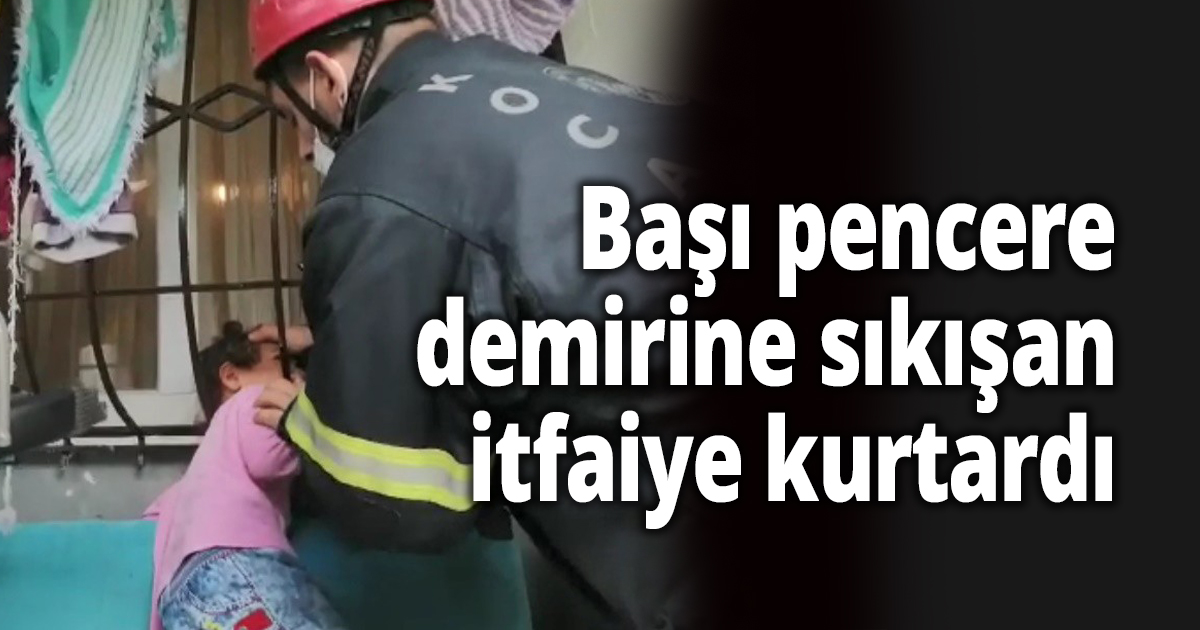 Başı pencere demirine sıkışan çocuğu itfaiye kurtardı