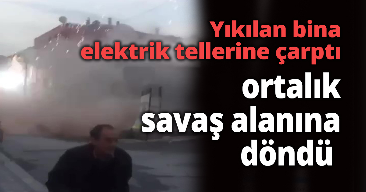 Yıkılan bina elektrik tellerine çarptı