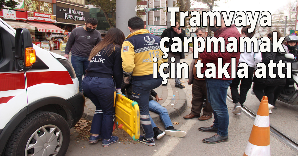 Tramvaya çarpmamak için takla attı