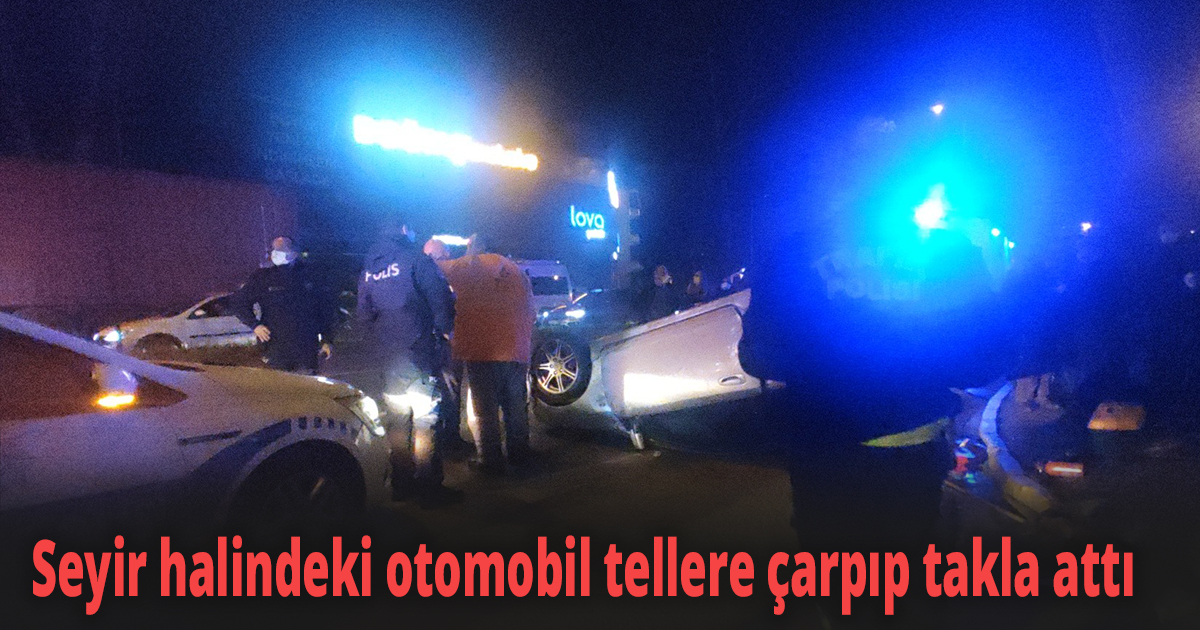 Seyir halindeki otomobil tellere çarpıp takla attı