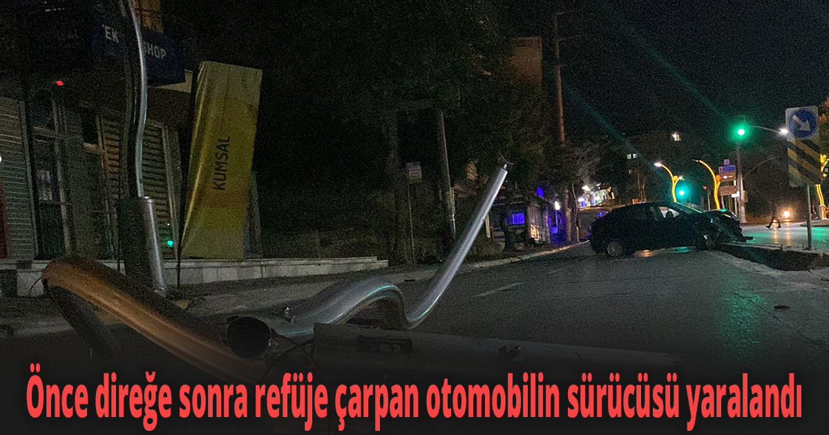 Önce direğe sonra refüje çarpan otomobilin sürücüsü yaralandı
