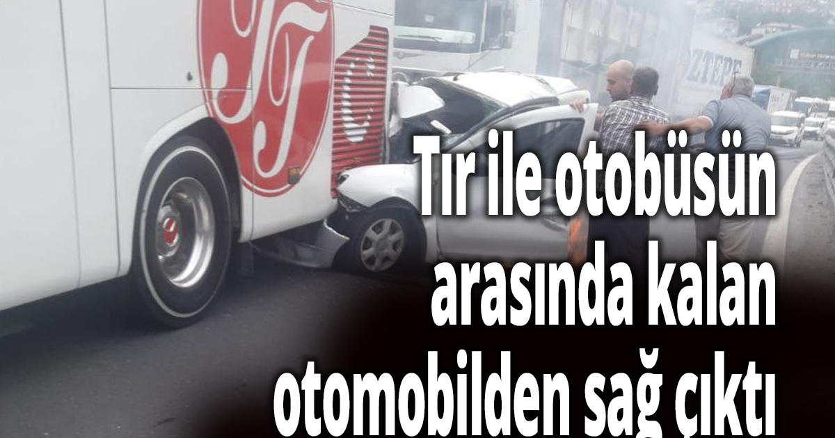 Tır ile otobüsün arasında kalan otomobilden sağ çıktı