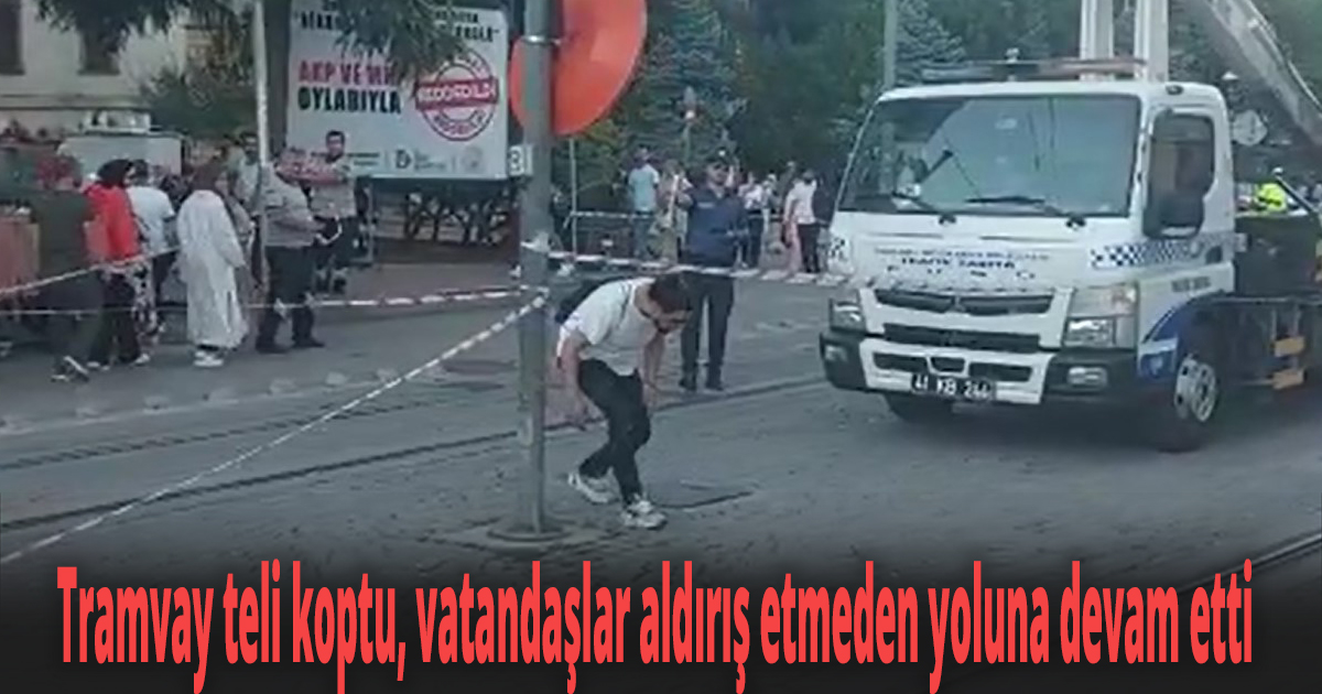 Tramvay teli koptu, vatandaşlar aldırış etmeden yoluna devam etti