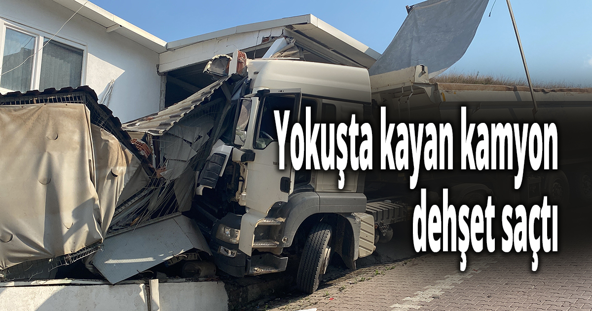 Yokuşta kayan kamyon dehşet saçtı