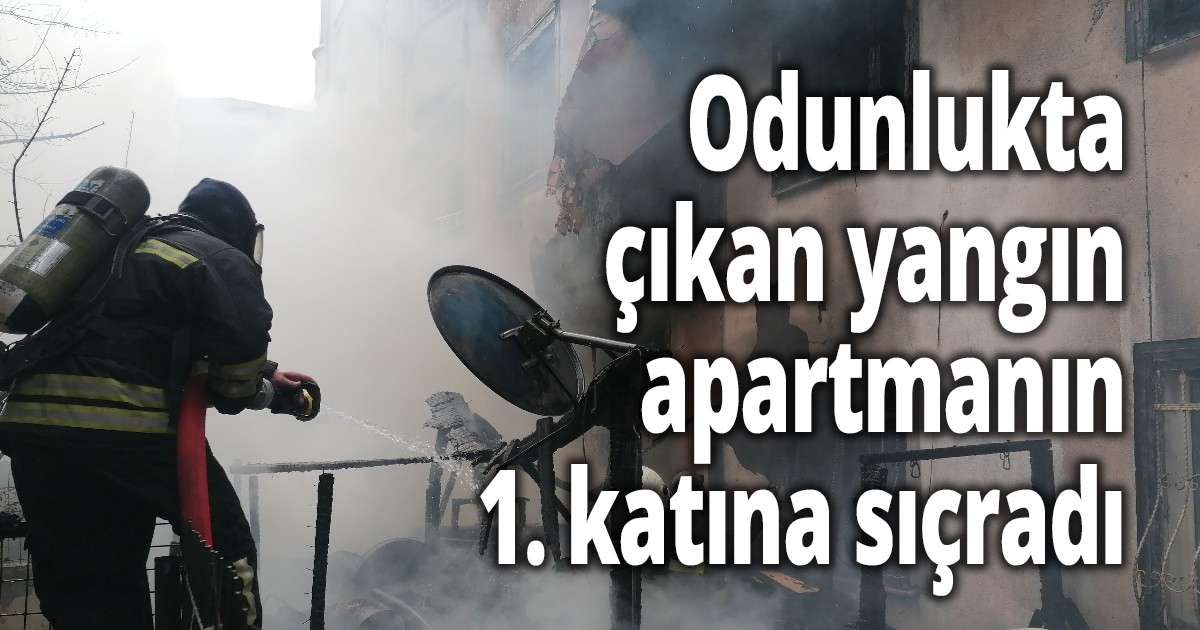 Odunlukta çıkan yangın apartmanın 1. katına sıçradı