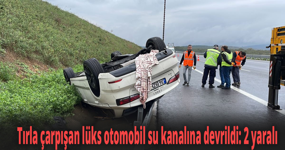 Tırla çarpışan lüks otomobil su kanalına devrildi