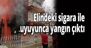Elindeki sigara ile uykuya daldı
