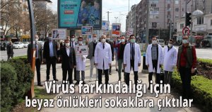 Virüs farkındalığı için beyaz önlükleri sokaklara çıktılar