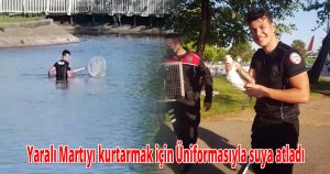 Üniformasıyla suya atladı