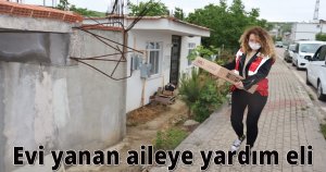 Evi yanan aileye yardım eli