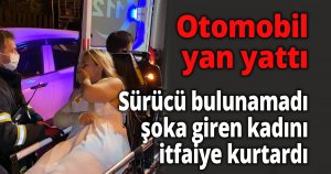Otomobil yan yattı, içinde bulunan kadın kurtarıldı