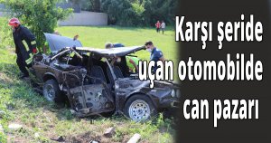 Karşı şeride uçan otomobilde can pazarı