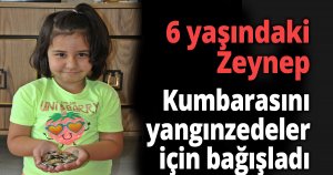 6 yaşındaki Zeynep kumbarasını yangınzedeler için bağışladı