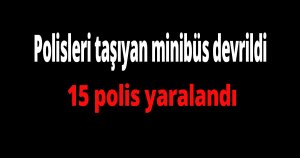 Polisleri taşıyan minibüs devrildi
