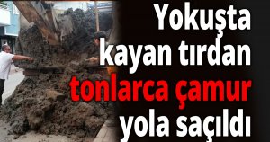 Yokuşta kayan tırdan tonlarca çamur yola saçıldı