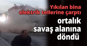 Yıkılan bina elektrik tellerine çarptı