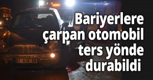 Bariyerlere çarpan otomobil ters yönde durabildi