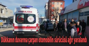 Tıra çarpmamak için manevra yapınca iş yerinin duvarına girdi