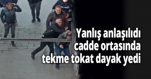 Yanlış anlaşılınca cadde ortasında tekme tokat darp edildi