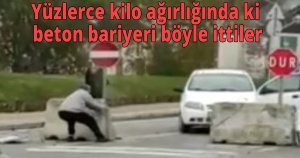 Yüzlerce kilo ağırlığındaki beton bariyeri böyle ittiler