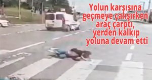 Yolun karşısına geçmeye çalışırken araç çarptı, yerden kalkıp yoluna devam etti