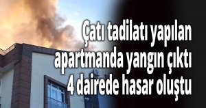 Çatı tadilatı yapılan apartmanda yangın çıktı