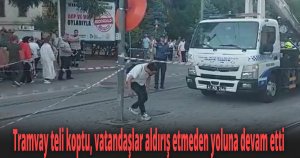 Tramvay teli koptu, vatandaşlar aldırış etmeden yoluna devam etti