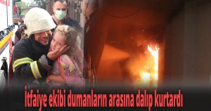 İtfaiye ekibi dumanların arasına dalıp kurtardı, mutluluğun fotoğrafı